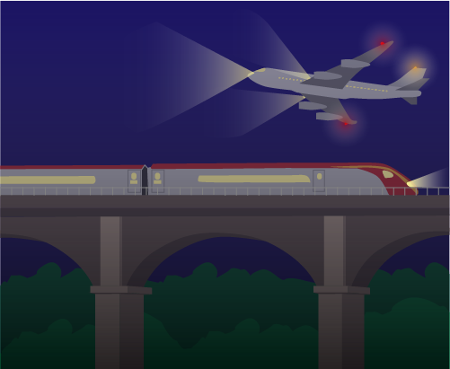 Illustration of a train crossing a bridge at night while a plane with lights on flies close overhead